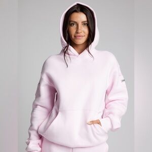 COMFRT TRAVEL ESSENTIALS POWDER Pink UNISEX HOODIE SIZE LARGE